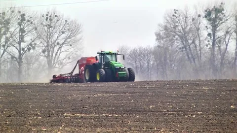 Sowing machinery in the field during spring work. Stock Footage 154165935
