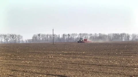 Sowing machinery in the field during spring work. Stock Footage 154165936