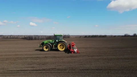 Sowing machinery in the field during spring work. Stock Footage 154165956
