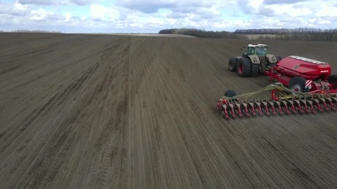 Sowing machinery in the field during spring work. Stock Footage 154165967