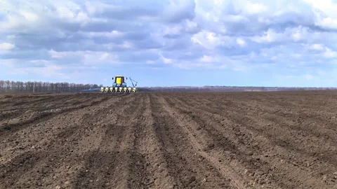 Sowing work in the field with agronomic units Video stock 155071002