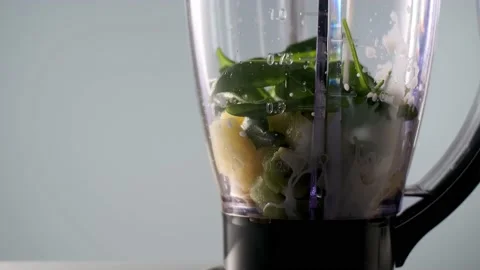 Soy milk is poured into blender to make vegan smoothie. Healthy nutrition for Stock Footage 170091237