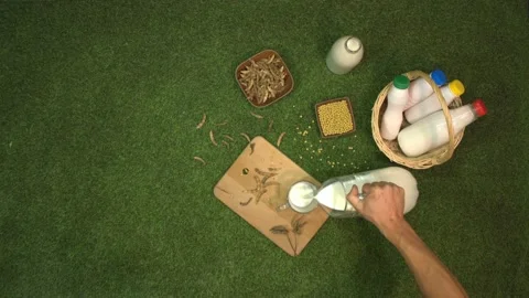 Soy milk. Slow motion 2x. Top view. Stockbeeldmateriaal 122628126