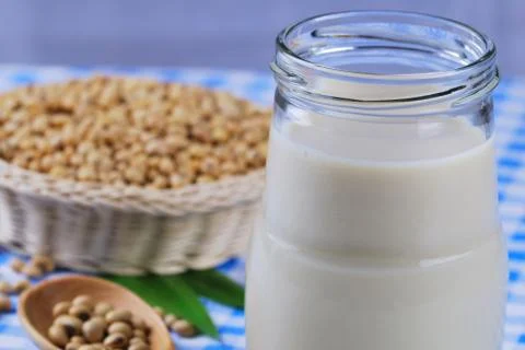 Soy milk with soy beans Stock Photos