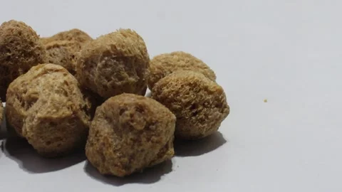 Soya chunks isolated on white background Stock Footage 136953540