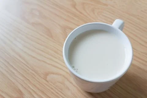Soymilk and bread Stock Photos