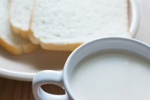 Soymilk and bread Stock Photos