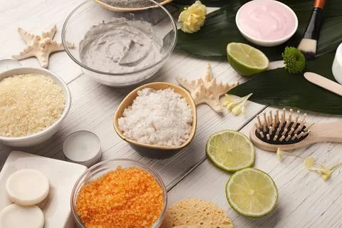 Spa accessories with soap, scrub, and natural elements Stock Photos