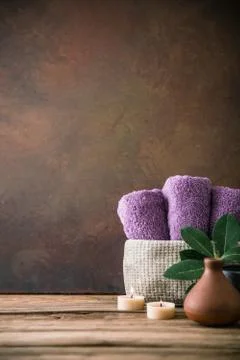 Spa and wellness setting with flowers and towels. Dayspa nature products Stock Photos