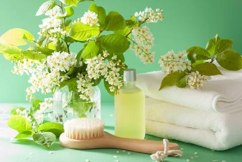Spa aromatherapy with bird cherry blossom essential oil brush towel Stock Photos