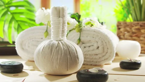 Spa background. Candles, flowers, massaging stones and herbal balls. Massage Stock Footage 231120285
