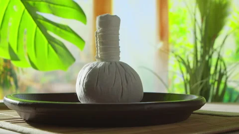 Spa background. Candles, flowers, massaging stones and herbal balls. Massage Stock Footage 231248191