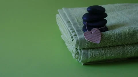 Spa background composition. Towel, stones. Stock Footage 148274447