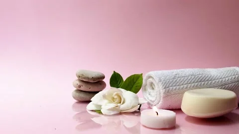 Spa background composition with white gardenia flower on pink background. Stock Footage 134567887
