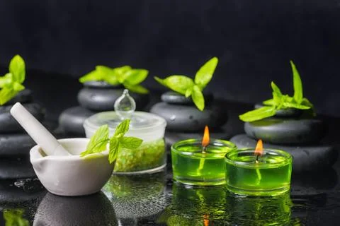 Spa background of pyramid zen basalt stones with water drops, mint, sea salt, Stock Photos