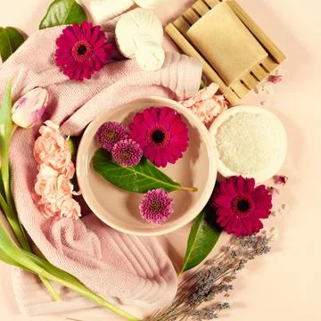 Spa background, relaxation concept on pink background. Flat lay Stock Photos