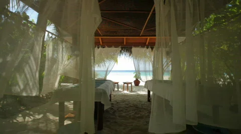Spa at beach with curtains Stock Footage 681746