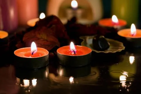 Spa candle dark settings Stock Photos