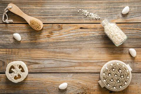 Spa composition with body care items on wooden background, top view. Stock Photos