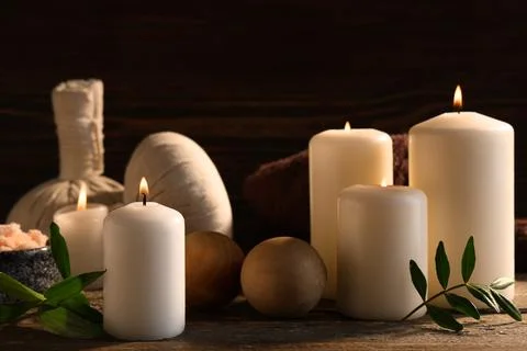 Spa composition with burning candles and massage balls on wooden background,  Stock Photos