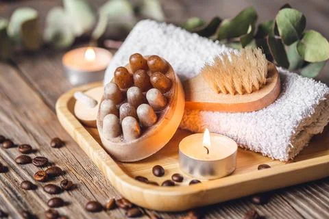 Spa composition with coffee massage scrub soap on a wooden surface. Stock Photos