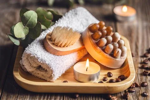 Spa composition with coffee massage scrub soap on a wooden surface. Stock Photos