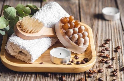Spa composition with coffee massage scrub soap on a wooden surface. Stock Photos