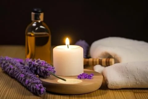 Spa composition on massage with Soft White Towels, Essential Oils, stones, .. Stock Photos