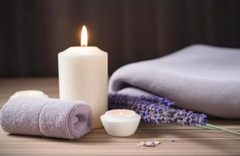 Spa composition on massage with Soft White Towels, Essential Oils, stones, .. Stock Photos