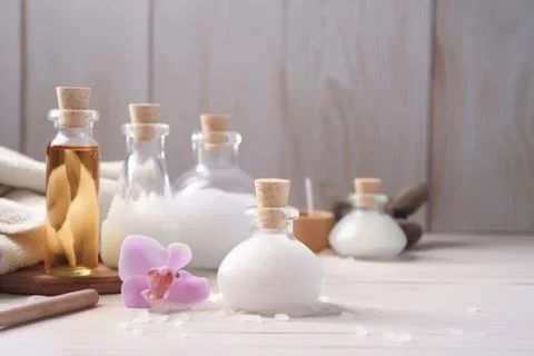 Spa composition on massage with Soft White Towels, Essential Oils, stones, .. Stock-Fotos
