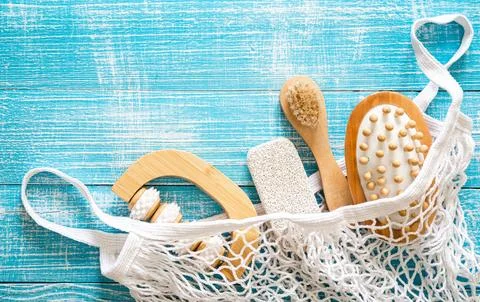 Spa composition with personal care items for body in a shopping bag, top view. Stock Photos