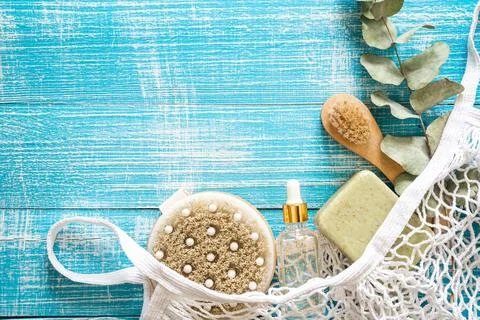 Spa composition with personal care items for body in a shopping bag, top view. Stock Photos