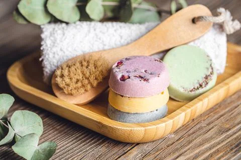 Spa composition with soap, brush and towel. Stock Photos