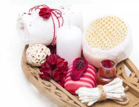Spa composition with spa accessories and towels on white background. Stock Photos