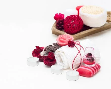 Spa composition with spa accessories and towels on white background. Stock Photos