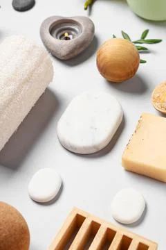 Spa composition with stones and bath supplies on white background, closeup Stock Photos