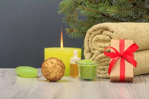 Spa composition with towel, gift box, oil, sea salt and soap. Stock Photos