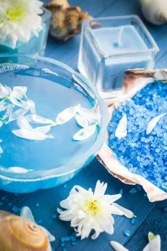 Spa composition water bath salt shells flowers Stock Photos