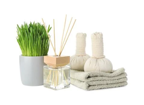 Spa composition with wheatgrass and herbal bags isolated on white Stock Photos