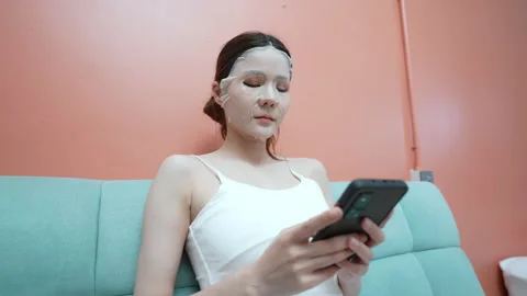 Spa concept of 4k Resolution. Asian woman wearing a mask in the house. Facial Stock Footage 171635777