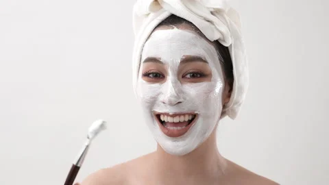 Spa concept of 4k Resolution. Asian woman applying facial cream in bedroom. M Stock Footage 237815856