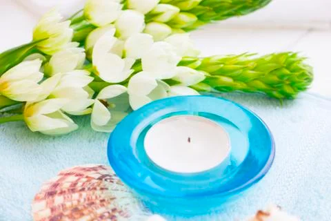 Spa concept with a candle Stock Photos