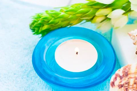 Spa concept with a candle Stock Photos