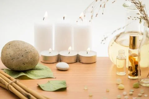 Spa concept, composition with bamboo, stones, leaves and candles Stock Photos