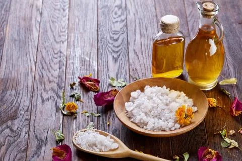 SPA concept: composition of spa treatment with natural sea salt, aromatic oil Stock Photos