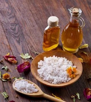 SPA concept: composition of spa treatment with natural sea salt, aromatic oil Stock Photos