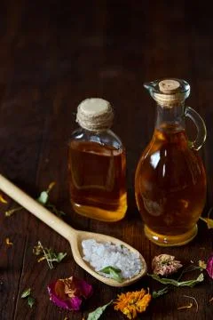 SPA concept: composition of spa treatment with natural sea salt, aromatic oil Stock Photos
