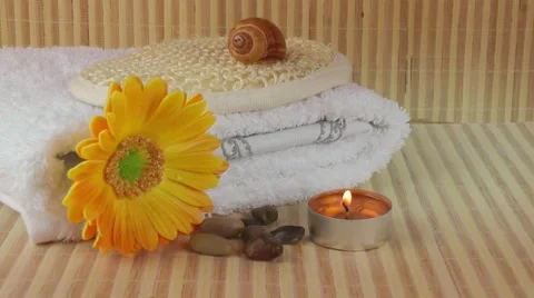 Spa Concept with flower,towel,seashell and candle Stock Footage 67749837