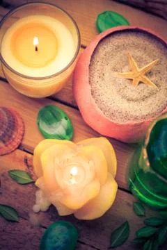 Spa concept sea sand shell scented candles Stock Photos