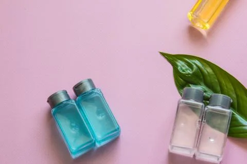 Spa cosmetics set. Copyspace for text. Top view. Flatlay on pink background. Stock Photos